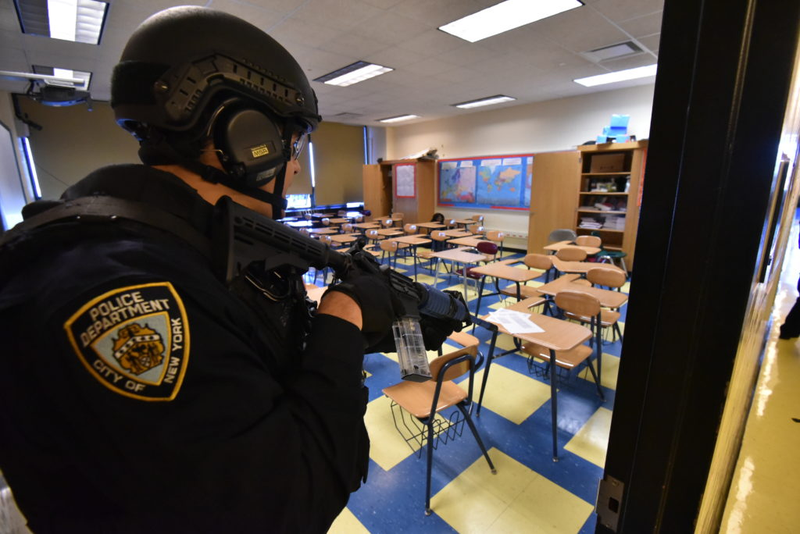 Police search through a Brooklyn high school during an active shooter drill on May 15, 2016 (NYPD)